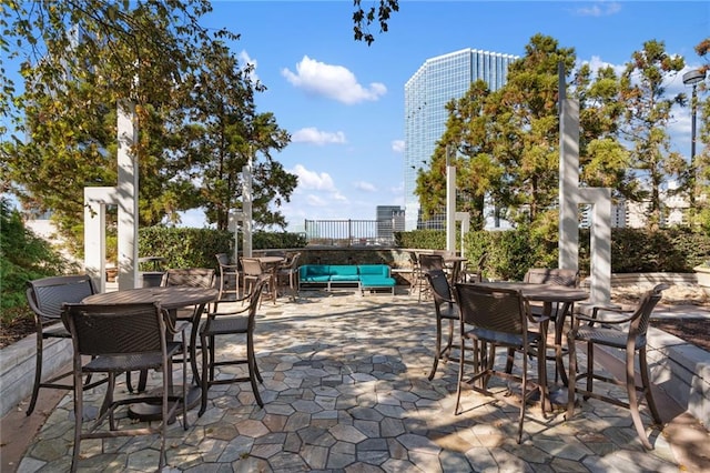 3324 Peachtree Rd NE Unit 1813, Atlanta, GA 30305 - view of patio / terrace featuring outdoor dining space and an outdoor hangout area