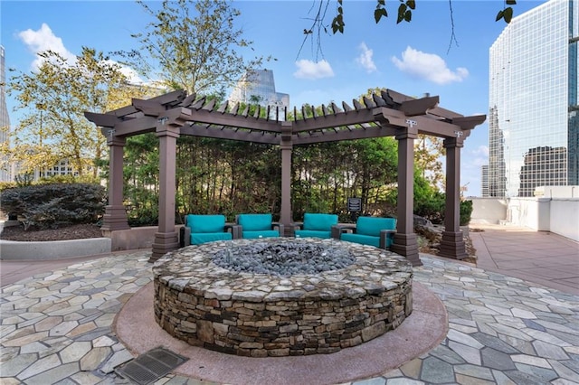 3324 Peachtree Rd NE Unit 1813, Atlanta, GA 30305 - view of patio / terrace featuring an outdoor fire pit and a pergola