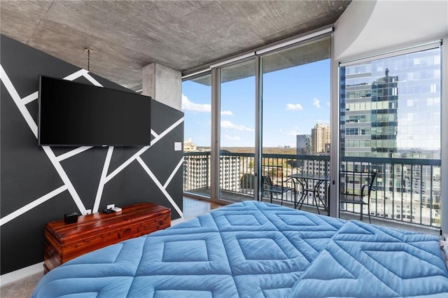 3324 Peachtree Rd NE Unit 1813, Atlanta, GA 30305 - bedroom featuring access to exterior, a city view, and floor to ceiling windows