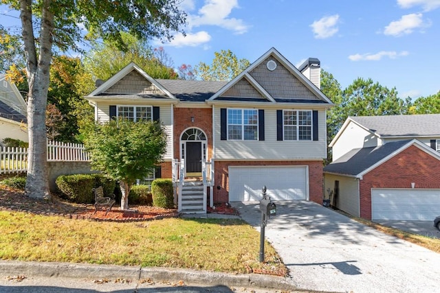 view of front facade featuring a front yard and a garage