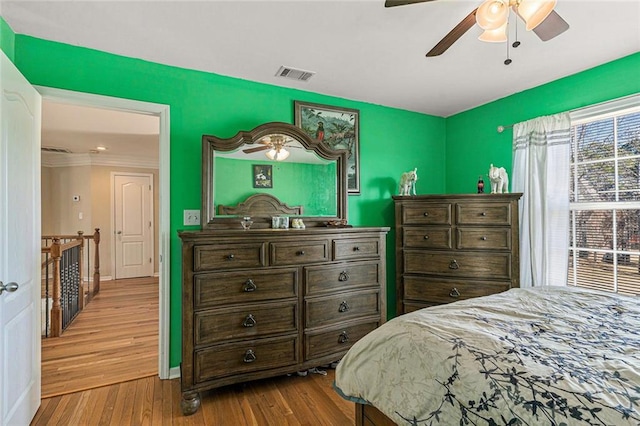 bedroom featuring ceiling fan and light wood-type flooring