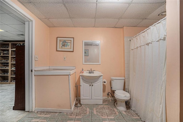 bathroom featuring vanity, toilet, and walk in shower