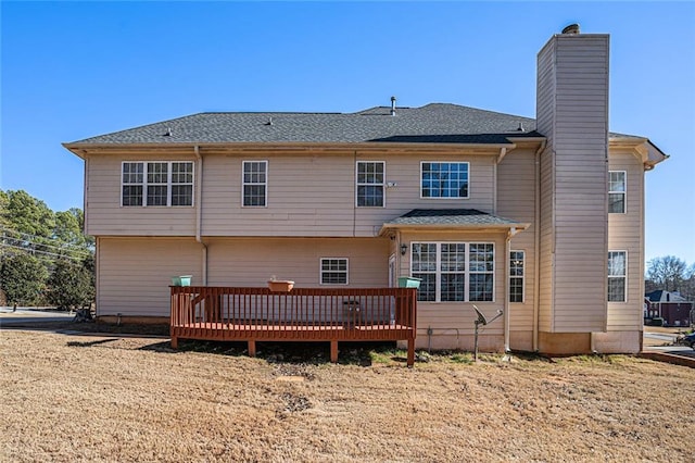 rear view of property with a deck