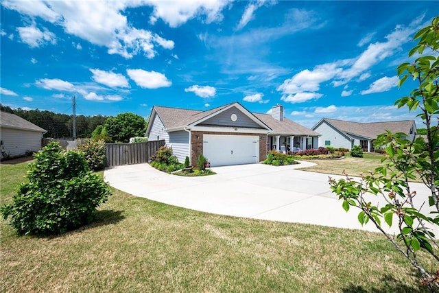 view of front of property with fence, a front lawn, concrete driveway, brick siding, and a garage