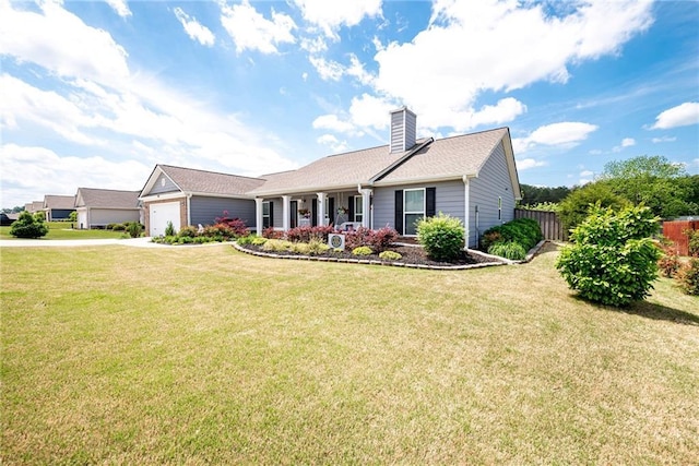 view of front of home with a chimney, concrete driveway, a front lawn, an attached garage, and fence
