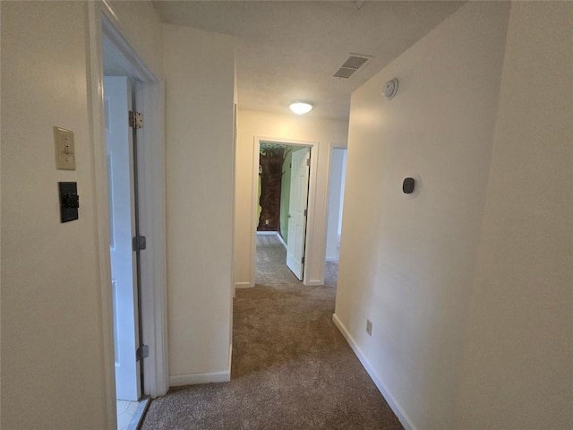 639 Royal Abbey Dr, Stone Mountain, GA 30088 - corridor featuring carpet and baseboards
