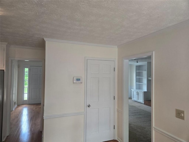 639 Royal Abbey Dr, Stone Mountain, GA 30088 - corridor featuring crown molding, a textured ceiling, wood-type flooring, and baseboards