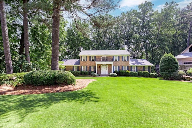 5287 Vernon Lake Dr, Atlanta, GA 30338 - colonial inspired home with a front lawn and brick siding