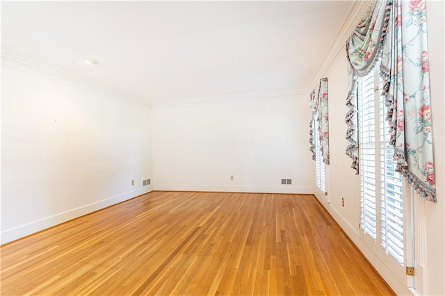 5287 Vernon Lake Dr, Atlanta, GA 30338 - spare room with ornamental molding, light wood-type flooring, healthy amount of natural light, and baseboards
