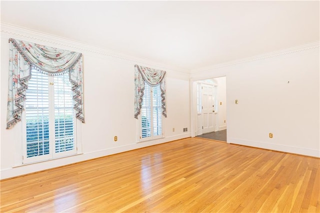 5287 Vernon Lake Dr, Atlanta, GA 30338 - unfurnished room with light wood finished floors, plenty of natural light, baseboards, and ornamental molding