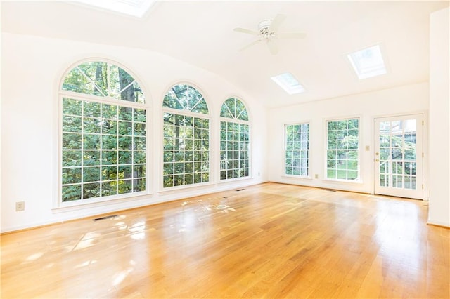 5287 Vernon Lake Dr, Atlanta, GA 30338 - unfurnished living room featuring a skylight, a ceiling fan, wood finished floors, and vaulted ceiling