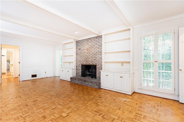 5287 Vernon Lake Dr, Atlanta, GA 30338 - unfurnished living room with beam ceiling, a brick fireplace, and built in features