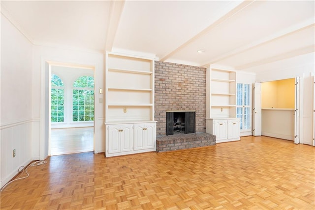 5287 Vernon Lake Dr, Atlanta, GA 30338 - unfurnished living room with beamed ceiling, a fireplace, and built in shelves