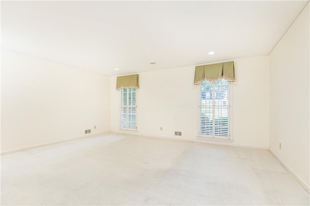 5287 Vernon Lake Dr, Atlanta, GA 30338 - spare room with light carpet, recessed lighting, and baseboards