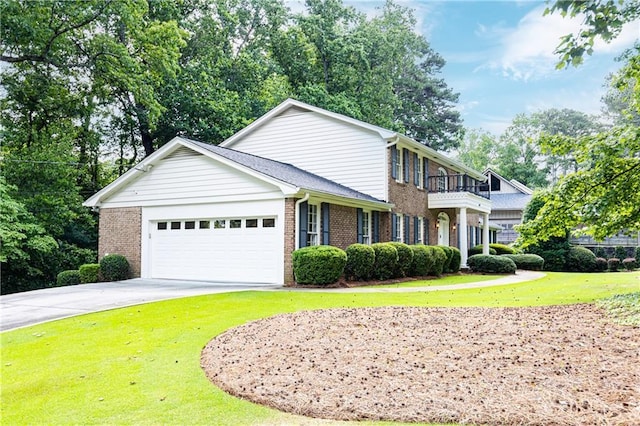 5287 Vernon Lake Dr, Atlanta, GA 30338 - view of front of home featuring brick siding, a balcony, driveway, an attached garage, and a front lawn