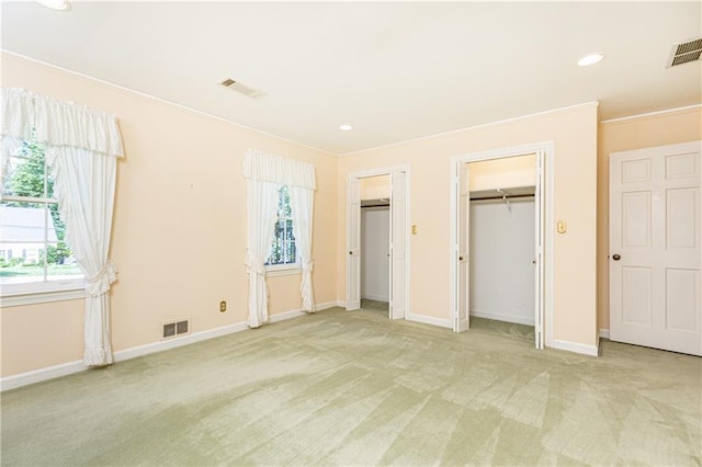 5287 Vernon Lake Dr, Atlanta, GA 30338 - unfurnished bedroom with carpet floors, multiple closets, multiple windows, baseboards, and recessed lighting