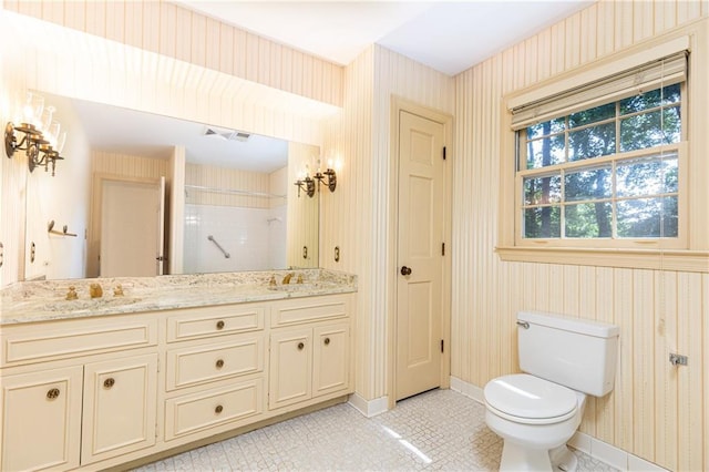 5287 Vernon Lake Dr, Atlanta, GA 30338 - bathroom with wallpapered walls, double vanity, toilet, a shower, and tile patterned floors