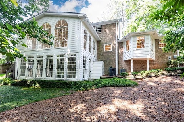 5287 Vernon Lake Dr, Atlanta, GA 30338 - rear view of property featuring cooling unit and brick siding