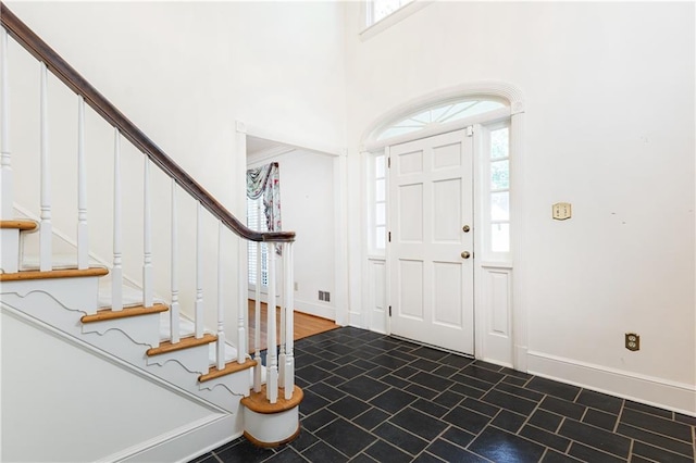 5287 Vernon Lake Dr, Atlanta, GA 30338 - foyer entrance with healthy amount of natural light, stairs, and baseboards