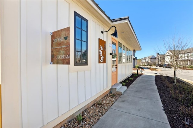 83 Arnold Poplar Ln, Auburn, GA 30011 - view of home's exterior featuring board and batten siding and a residential view