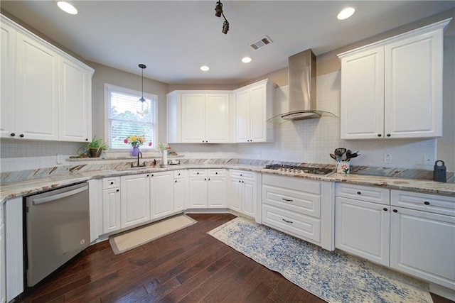 4645 Waterford Dr, Suwanee, GA 30024 - kitchen with stainless steel appliances, wall chimney exhaust hood, dark wood-type flooring, white cabinetry, and recessed lighting
