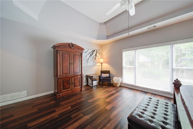 4645 Waterford Dr, Suwanee, GA 30024 - sitting room with dark wood-style flooring, baseboards, ceiling fan, and a raised ceiling