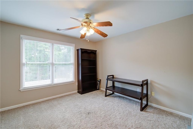 4645 Waterford Dr, Suwanee, GA 30024 - carpeted bedroom with baseboards and a ceiling fan