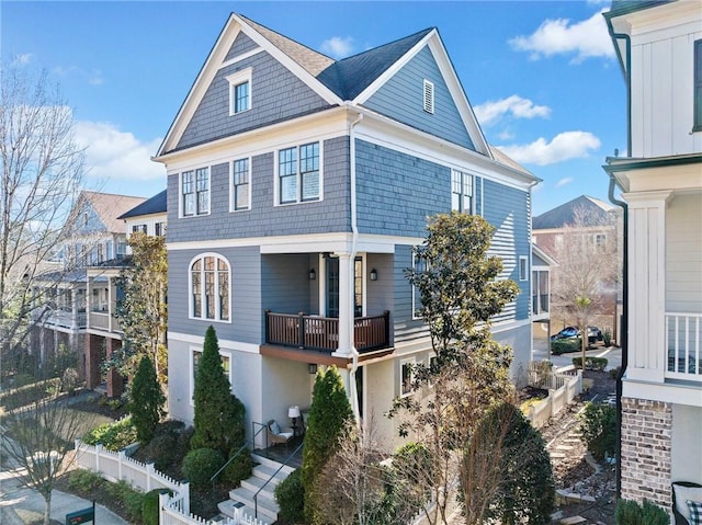 view of front of home with fence