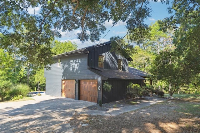 view of property exterior featuring a garage