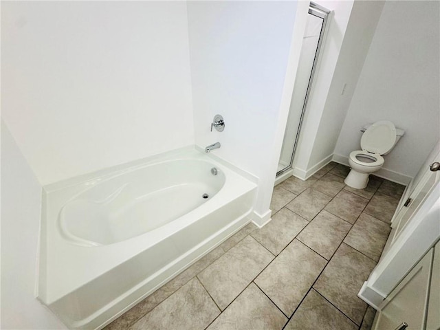 full bath with a shower stall, a bath, toilet, tile patterned flooring, and baseboards