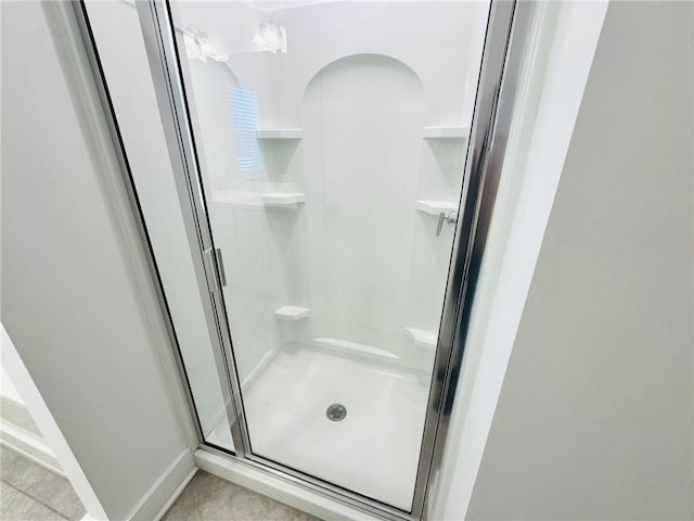 bathroom featuring a stall shower