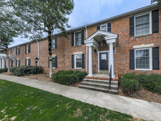 multi unit property with brick siding