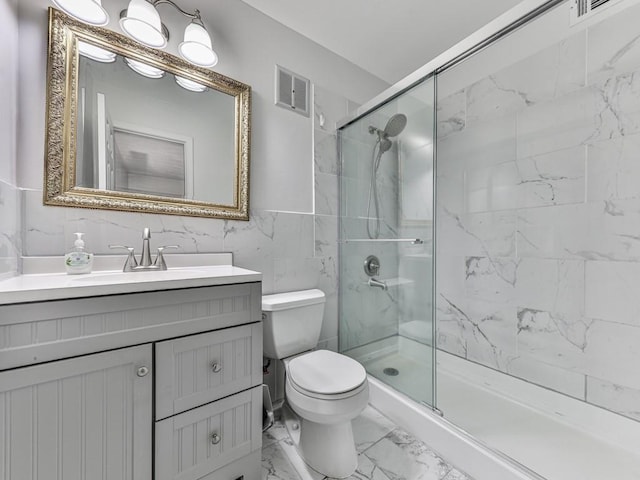 full bathroom featuring toilet, marble finish floor, a stall shower, and visible vents