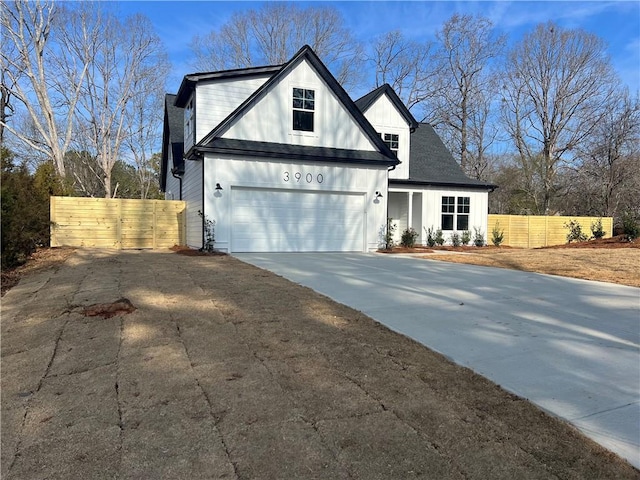 view of front of property featuring a garage