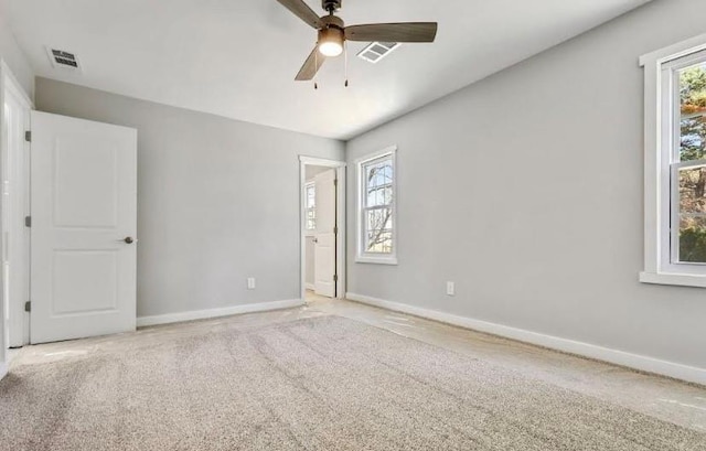 1382 Bennett Rd, Grayson, GA 30017 - unfurnished bedroom with baseboards, carpet flooring, and ceiling fan