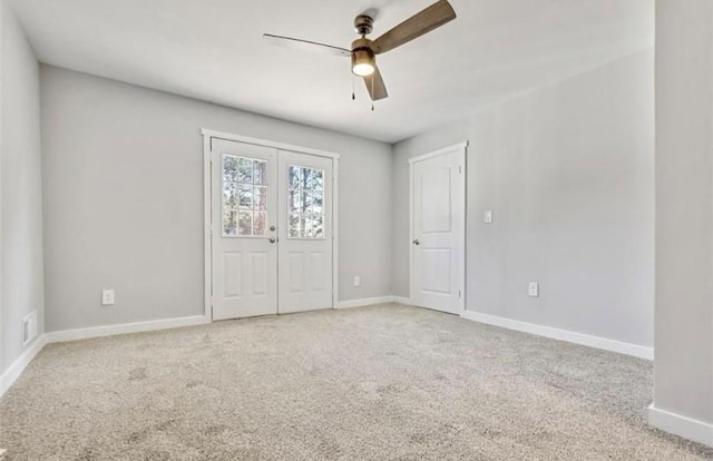 1382 Bennett Rd, Grayson, GA 30017 - unfurnished bedroom featuring light colored carpet, baseboards, a closet, and french doors