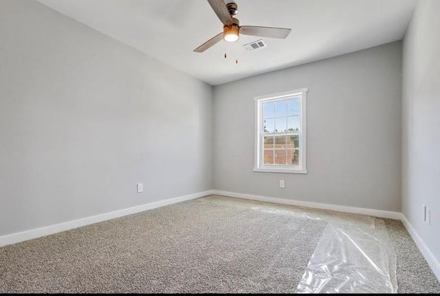 1382 Bennett Rd, Grayson, GA 30017 - empty room with light carpet, ceiling fan, and baseboards