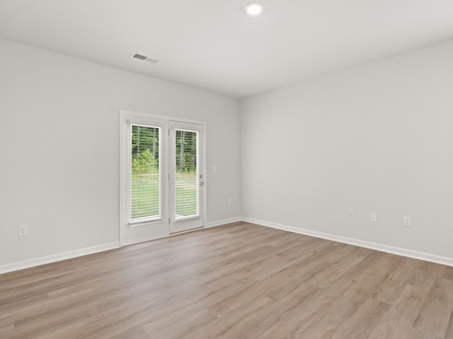 885 Lost Creek Blvd, Dallas, GA 30132 - unfurnished room featuring light wood-style floors and recessed lighting