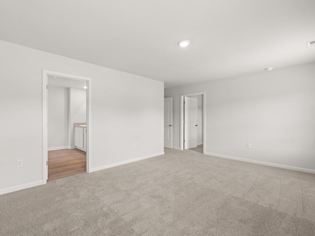 885 Lost Creek Blvd, Dallas, GA 30132 - unfurnished room with light carpet and recessed lighting