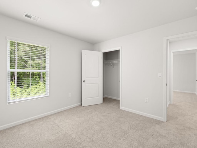 885 Lost Creek Blvd, Dallas, GA 30132 - unfurnished bedroom with light colored carpet and a closet