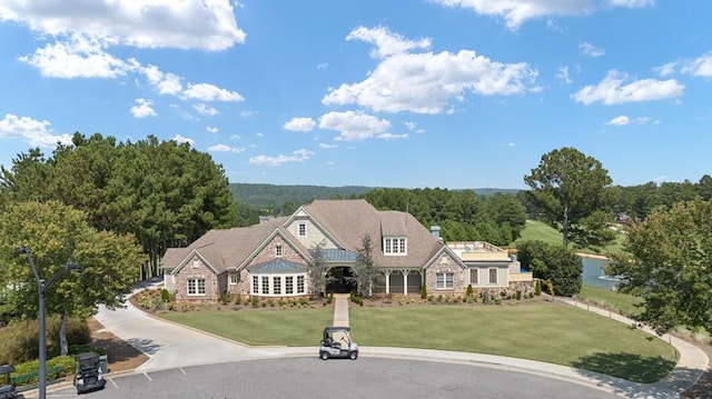 885 Lost Creek Blvd, Dallas, GA 30132 - view of front of house featuring stone siding and a front lawn