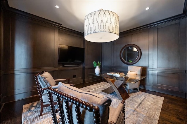 interior space with crown molding and dark hardwood / wood-style flooring