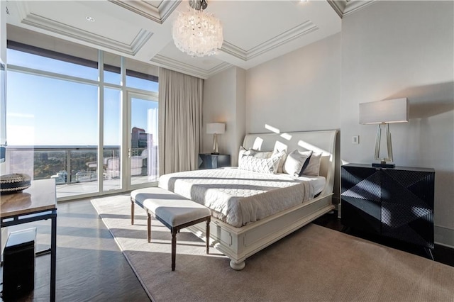 bedroom with crown molding, a wall of windows, access to exterior, coffered ceiling, and a notable chandelier