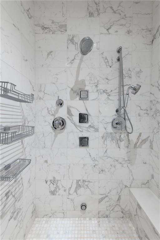 bathroom featuring tiled shower