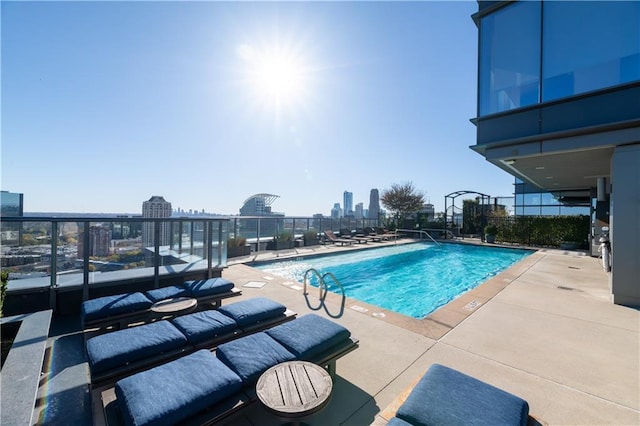 view of pool featuring a patio