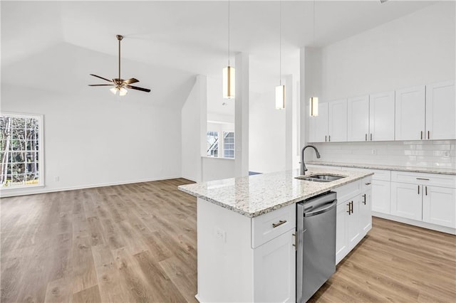 kitchen with white cabinets, dishwasher, ceiling fan, and sink