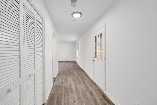 hall featuring light hardwood / wood-style floors