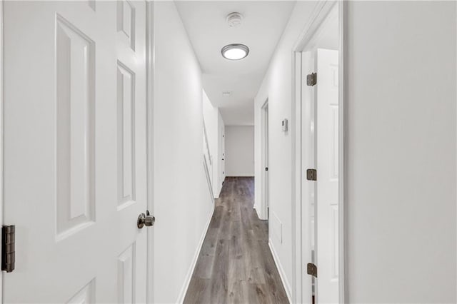 hallway featuring light hardwood / wood-style floors