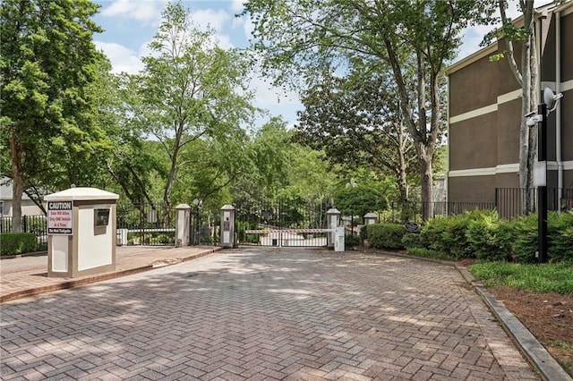 exterior space with a gate and fence