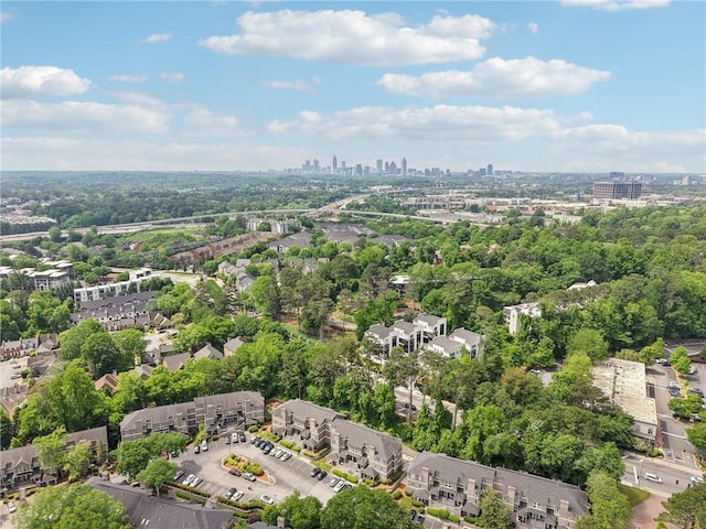 birds eye view of property with a city view